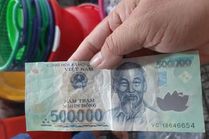 Hướng dẫn xử lý tiền giả, tiền nghi giả trong ngành ngân hàng