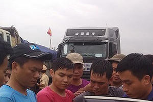 Vận chuyển gần 2 kg ma túy đá giấu trong hộp ô tô