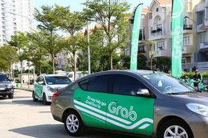 Bộ Giao thông Vận tải báo cáo Chính phủ về quy định gắn hộp đèn cho taxi công nghệ