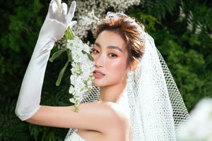 Đỗ Mỹ Linh diện váy cô dâu