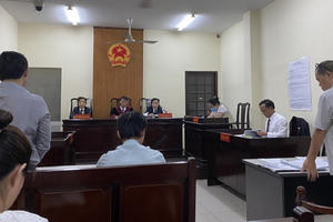 Grab “xuống nước” trong vụ tài xế kiện đòi bồi thường