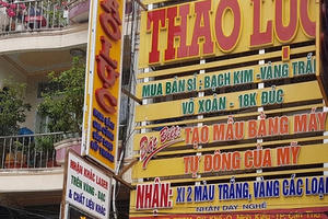 Vụ đổi 100 USD phạt 270 triệu: Lệnh khám nhà được ký trước 6 ngày vì nghi ngờ có dấu hiệu vi phạm?