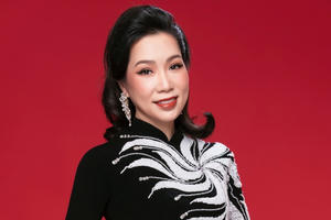 Trịnh Kim Chi làm "nàng thơ" áo dài