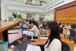 Kho bạc Nhà nước nói gì về hiện tượng chi trả chậm tiền lương sau thực hiện chính quyền địa phương 2 cấp?