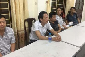 Hai vợ chồng câu kết cùng chủ quán photo làm giả 210 phiếu xét nghiệm