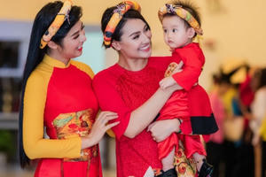 Hồng Quế bế con gái diễn áo dài cho Hoa hậu Ngọc Hân