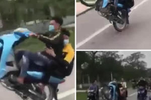 Nhóm “quái xế” nẹt bô, bốc đầu, phóng như bay trên cầu Cửa Hội