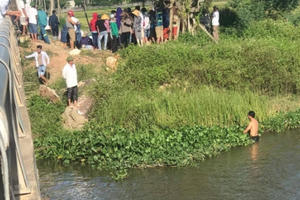 Thai phụ ôm 2 con thơ nhảy cầu tự vẫn, nỗ lực tìm kiếm 2 cháu nhỏ mất tích