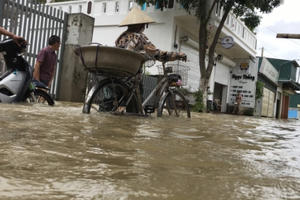 Chùm ảnh người dân thuộc huyện Quỳnh Lưu, Nghệ An oằn mình trong biển nước