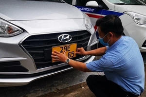 Xe kinh doanh vận tải không đổi sang biển vàng có bị xử phạt không?