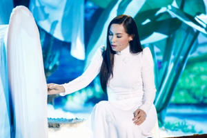 Phi Nhung đẹp hút hồn với áo dài trắng