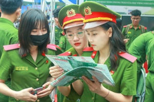 Bố từng đi tù và đã được xóa án tích có được dự tuyển vào trường Công an?