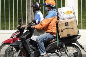 Hà Nội yêu cầu shipper hoạt động tại Vùng 1 phải có giấy xét nghiệm Covid-19