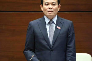 Phó Thủ tướng Trần Lưu Quang trả lời làm rõ 4 nhóm vấn đề các đại biểu Quốc hội quan tâm