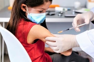 Những phản ứng nào có thể xảy ra đối với trẻ từ 5 - dưới 12 tuổi khi tiêm vaccine phòng COVID-19?