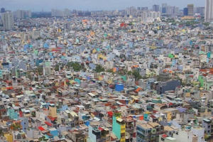 Cấp giấy phép xây dựng: Luật “gỡ”, địa phương vẫn “buộc” Cấp giấy phép xây dựng: Luật “gỡ”, địa phương vẫn “buộc”