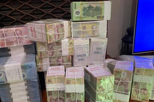 Cảnh báo vi phạm pháp luật khi đổi tiền mới, tiền lẻ dịp Tết Nguyên đán