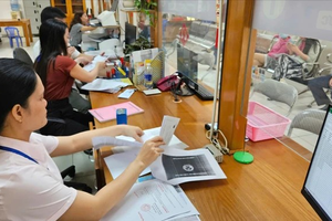 TP HCM chuyển hơn 100.000 biên chế cấp huyện về xã