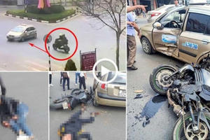 Kinh hoàng cảnh xe mô tô phân khối lớn tông ngang xe taxi làm 2 thanh niên bất tỉnh tại chỗ
