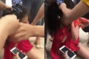 Cô gái trẻ bị nhóm người cắt phăng mái tóc vì không tiết lộ mật khẩu điện thoại