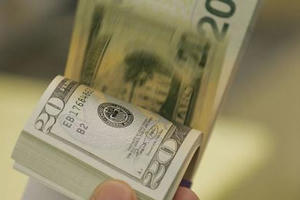 Nhà đầu tư ngoại rút vốn: USD-bài toán khó về tỉ giá