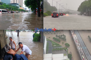 Video, hình ảnh: Hà Nội mưa trắng trời, nhiều nơi lại ngập sâu, giao thông tê liệt