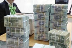 Chống dịch COVID-19: Ngân hàng giảm lãi suất 'sâu' nhất kể từ năm 2009