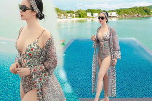 Giáng My diện áo tắm xẻ ngực sâu, gợi cảm hút hồn ở tuổi U50