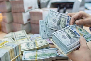Dừng đà tăng nóng, đồng USD quay đầu giảm