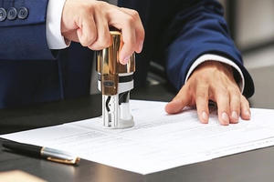 Từ 1/7, người dân đi công chứng phải chụp ảnh để lưu trữ hồ sơ