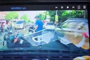 Bắt khẩn cấp kẻ đánh dã man phụ nữ sau va chạm giao thông