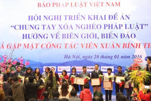 Toàn cảnh Hội nghị triển khai đề án "Chung tay xóa nghèo pháp luật"