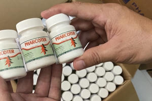 Giám định thành phần trong hàng ngàn lọ thuốc ho giả vừa bị bắt giữ