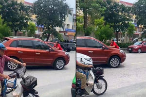 Xôn xao Clip người đàn ông bám đầu ô tô đang chạy tại Hà Tĩnh