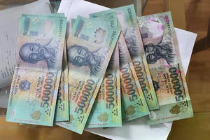 Hướng dẫn quy trình xử lý tiền giả, tiền nghi giả trong ngành ngân hàng