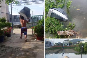 Nam thanh niên vác tivi ném thẳng xuống ao sau khi đội tuyển U22 thua trận