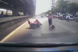 Cảnh sát tuy tìm tài xế xe tải cố tình chèn ngã người đi xe máy