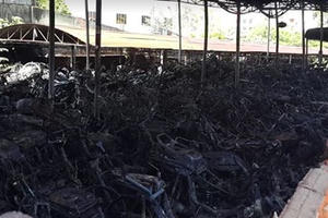 Ai chịu trách nhiệm trong vụ cháy kho tạm giữ xe của công an Biên Hòa?