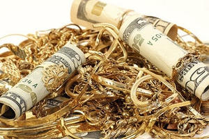 Vàng giảm giá, USD mạnh lên