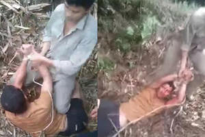 Video Clip: Người đàn ông bị đánh đập dã man rồi trói tay lôi đi