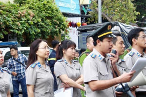 Gỡ vướng thanh toán tiền thi hành án trong trường hợp phải ủy thác