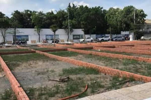 Có được làm thủ tục sang nhượng đất cùng lúc với tách thửa không?