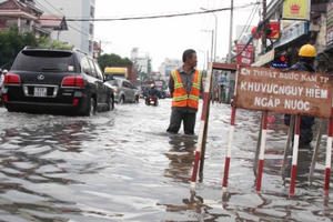 Địa ốc 24h: TP HCM xin hủy dự án chống ngập, sổ đỏ ghi tên các thành viên trong gia đình từ 5/12