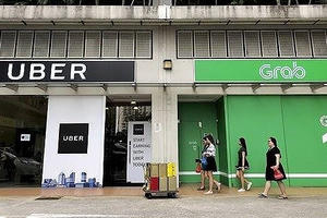 Vụ sáp nhập Grab - Uber không phạm luật