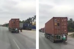Lái xe máy một tay núp sau container tránh rét, nam thanh niên nhận cái kết lạnh ngắt