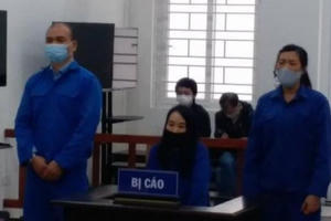 Làm giả giấy tờ cư trú cho 2 người Trung Quốc đang bị truy nã