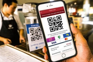 Đẩy mạnh thanh toán không dùng tiền mặt: Cần giải pháp quyết liệt hơn