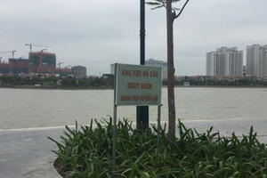 Hà Nội: Phát hiện thi thể phụ nữ nổi trên mặt hồ