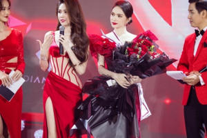 Ngọc Trinh khoe dáng quyến rũ với đầm đỏ xuyên thấu