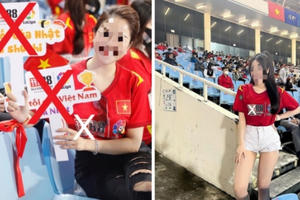 Hai cô gái ngang nhiên quảng cáo cho sàn đánh bạc tại SVĐ Mỹ Đình